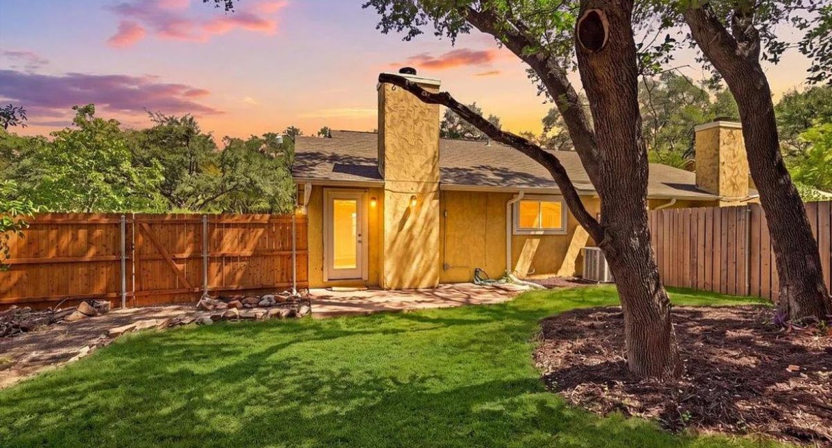 4902 Duval Rd Unit R2, Austin, TX — stone cottage at sunset