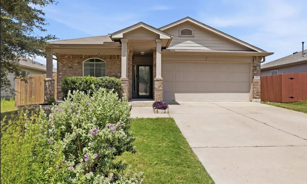 2712 Hearthsong Loop, Round Rock, TX — single-story brick front